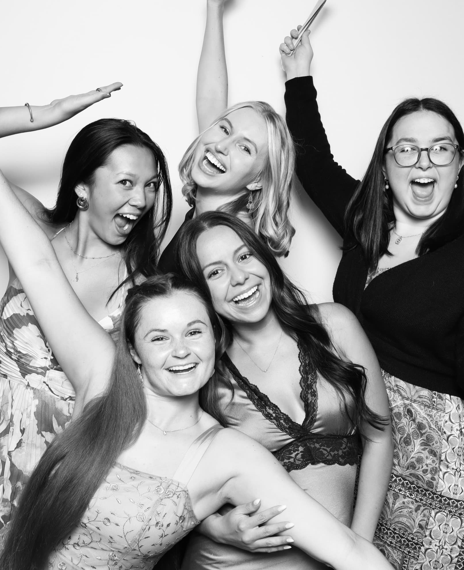 Photo booth rental setup with props and instant prints at an Austin event